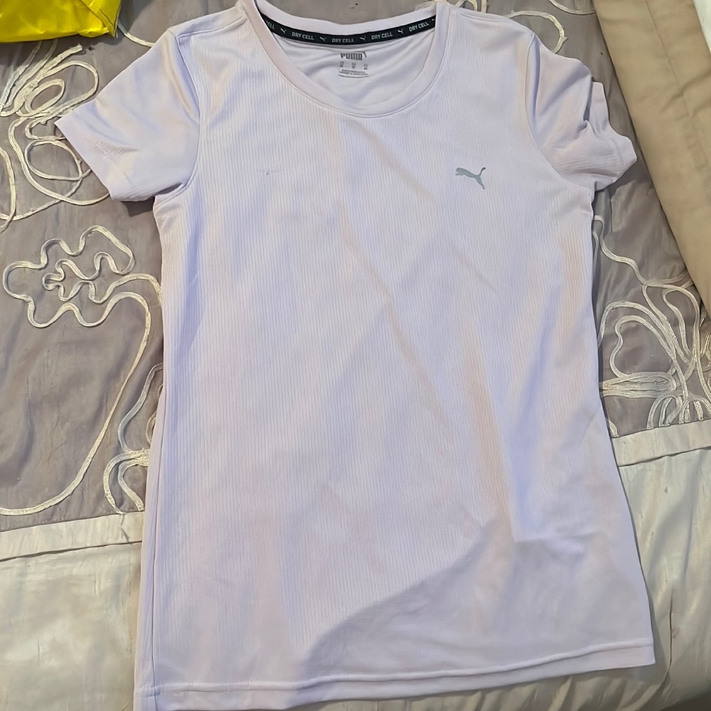Women’s puma shirt size xsmall never worn only tags ripped off